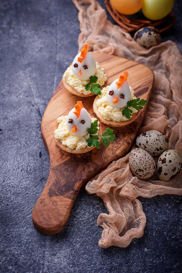 Chickens from eggs. Easter appetizers for party stock photo