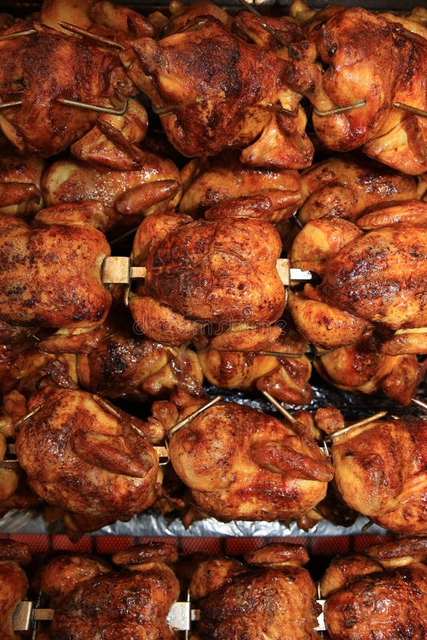 Chickens Roasting in Rotisserie in Germany Stock Photo - Image of ...
