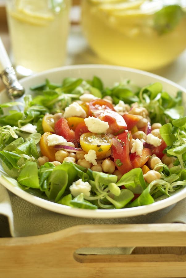 Chickpea and Pepper Salad with Cherry Tomatoes and Goat Cheese Stock
