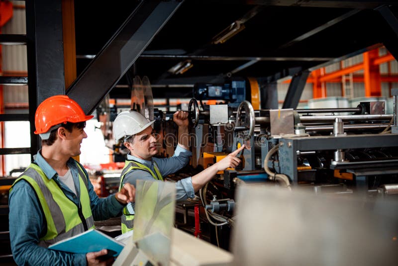 Chief Engineer is Looking at a Work that he is Checking Security System