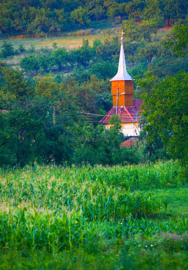 Rural church in village, full of vegetation. Rural church in village, full of vegetation