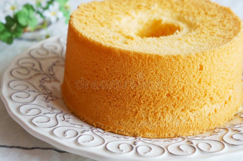 Chiffon Cake. Vanilla chiffon cake on a white plate royalty free stock photography