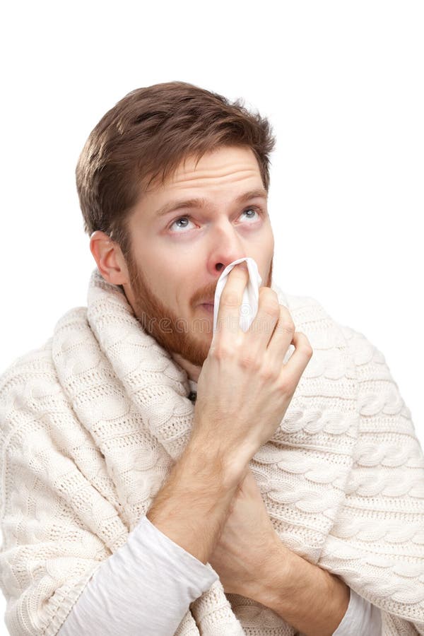 Sick young man holding wipes in his hands, isolated on white background. Sick young man holding wipes in his hands, isolated on white background