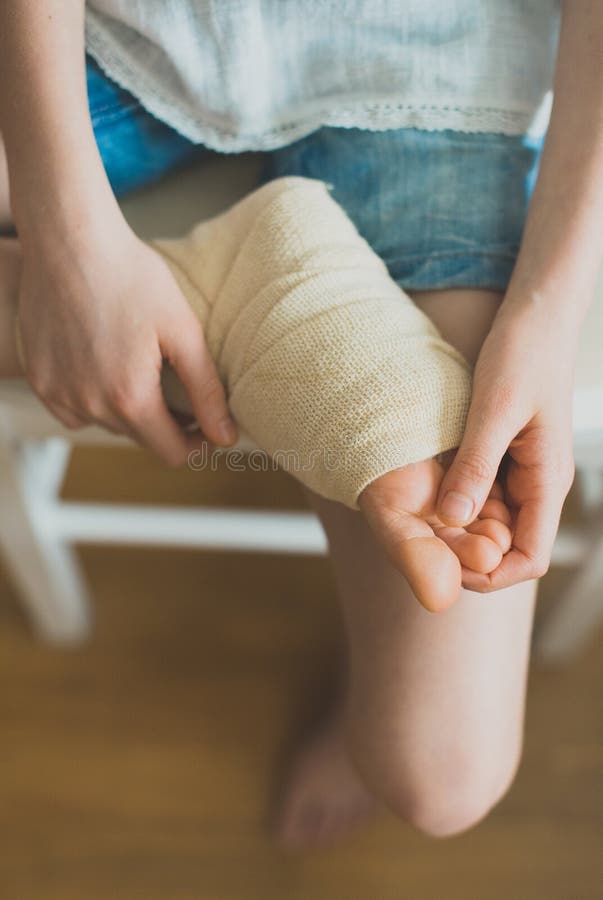 Child ankle. stock image. Image of bandaid, hands, little 108830439