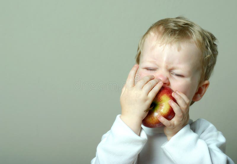 Child and apple