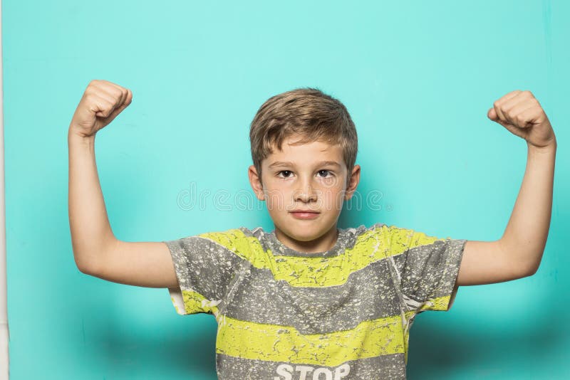 Child with Arms Raised on Biceps Stock Photo Image of male, child