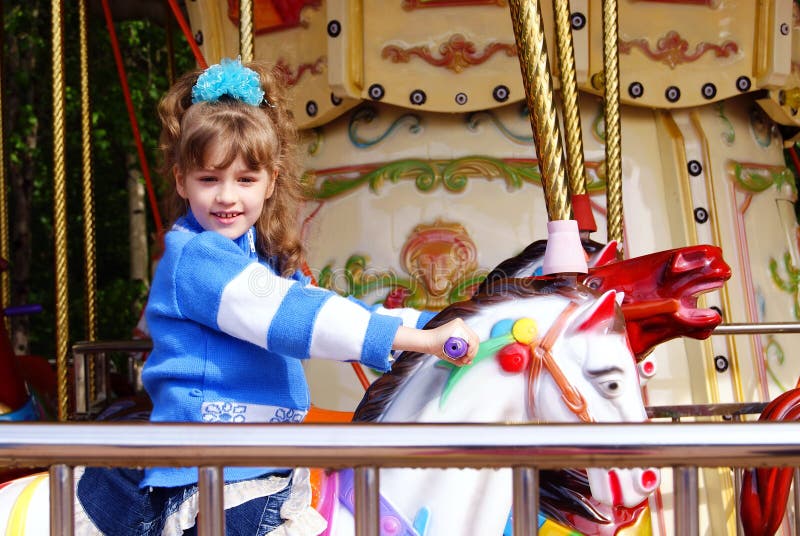 The child on an attraction stock photography