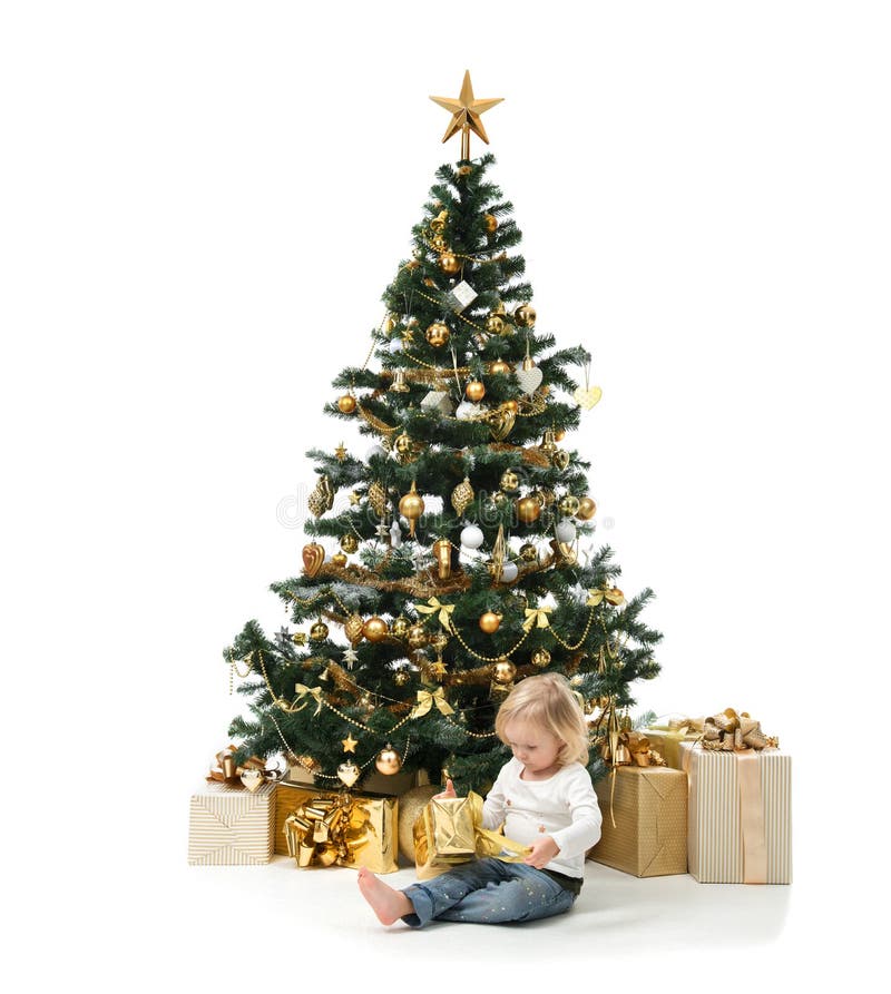 Child baby girl kid sitting and open new year present near decor stock photography Child baby girl kid sitting and open new year present near decor stock photography