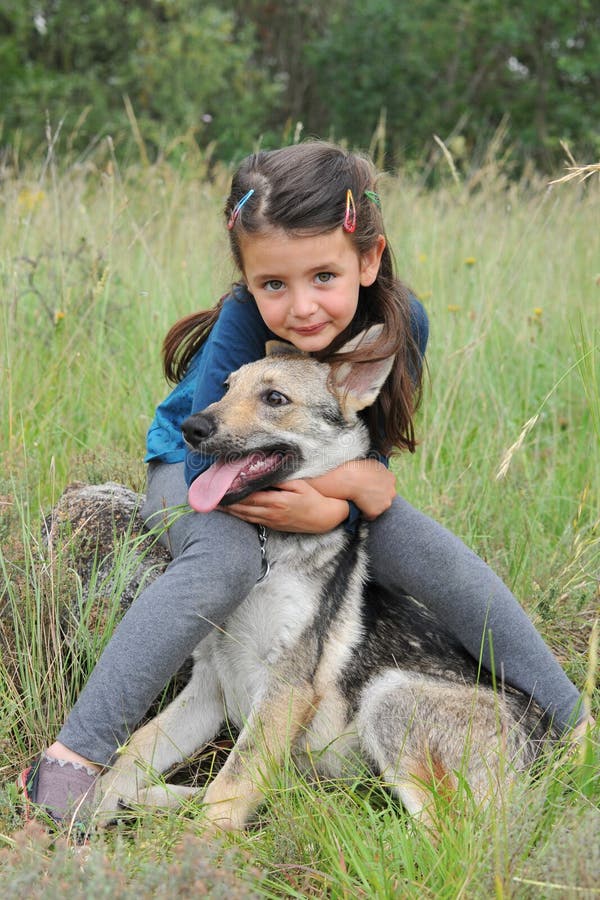 Child and baby wolf