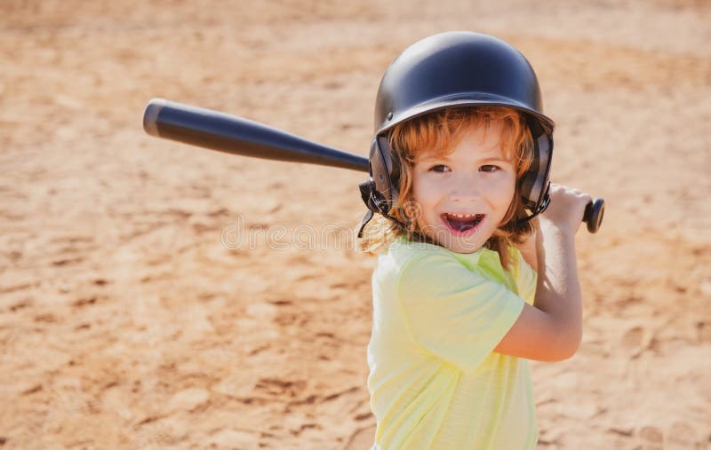 Child Baseball Player Focused Ready To Bat. Kid Holding a Baseball Bat