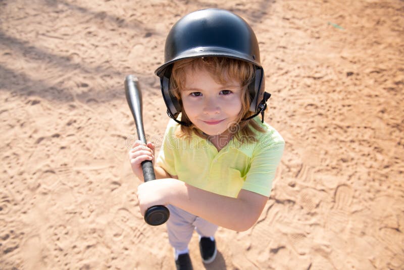 Child Batter about To Hit a Pitch during a Baseball Game. Kid Baseball