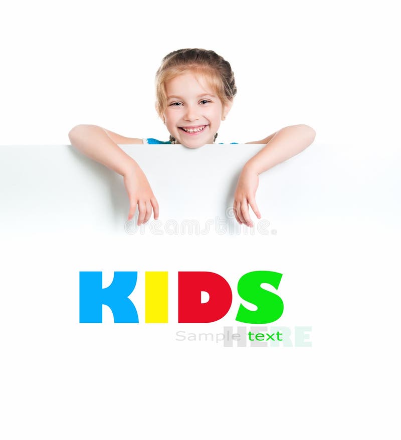 Child behind a board stock image