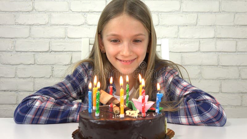 Child Birthday Party Blowing Candles, Children Anniversary, Kids Celebration royalty free stock photo Child Birthday Party Blowing Candles, Children Anniversary, Kids Celebration royalty free stock photo