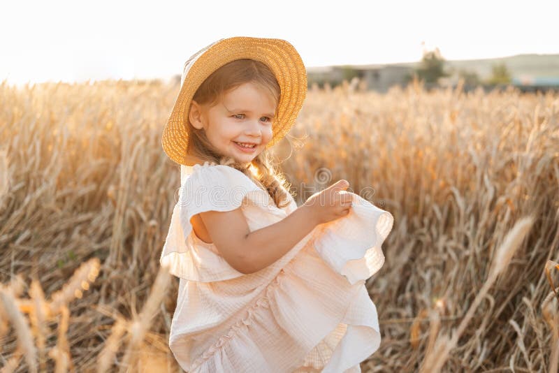 Toddler with Blonde Hair and Straw Hat - wide 1