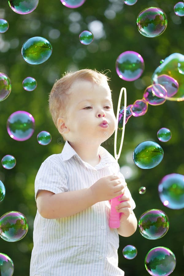 Child blow bubbles