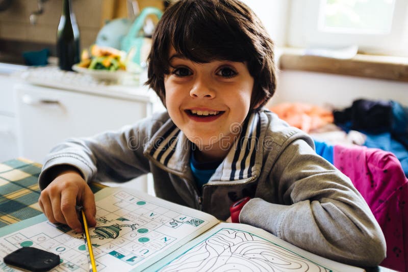 Child carries homework royalty free stock photography Child carries homework royalty free stock photography