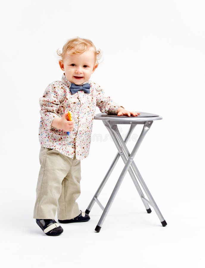 Child with chair royalty free stock photo Child with chair royalty free stock photo