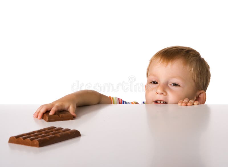 The child and a chocolate