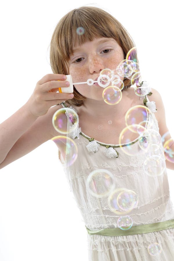 Child creating bubbles