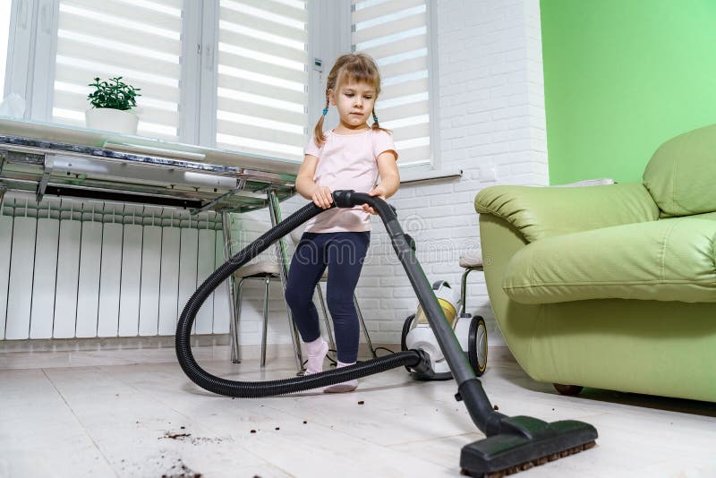 Child Does Cleaning with a Vacuum Cleaner Stock Photo Image of indoors, concept 201422230