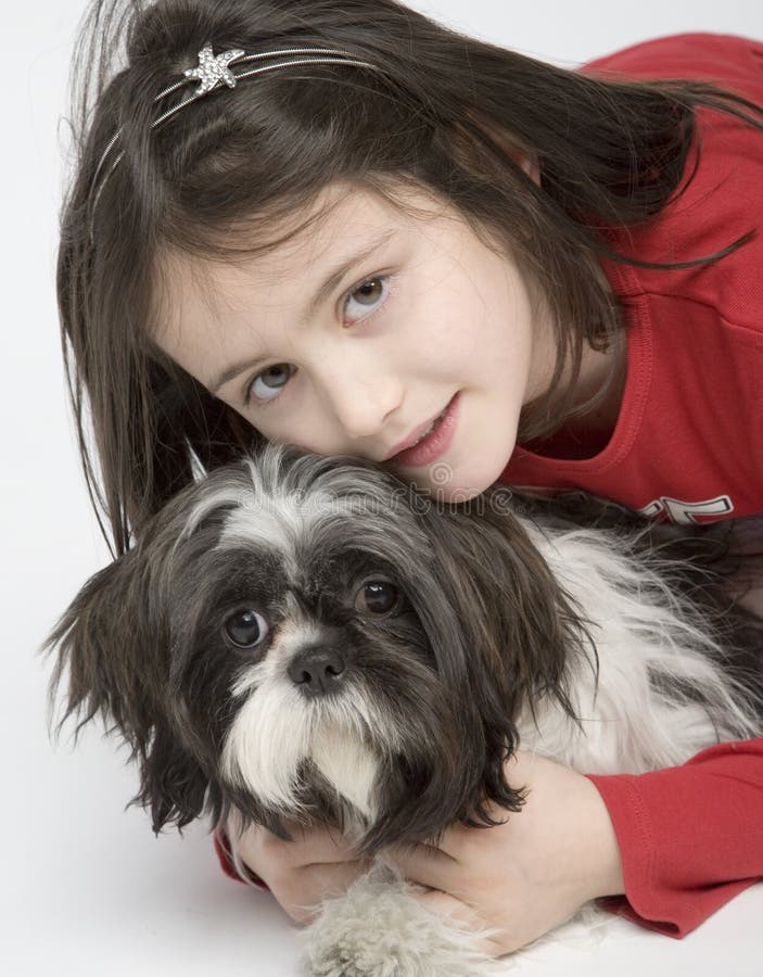 Child with dog pet