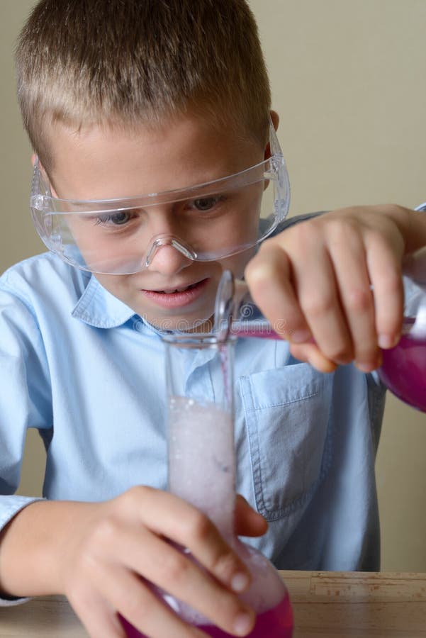 Child is Doing Experiments in Chemistry Stock Image Image of desk