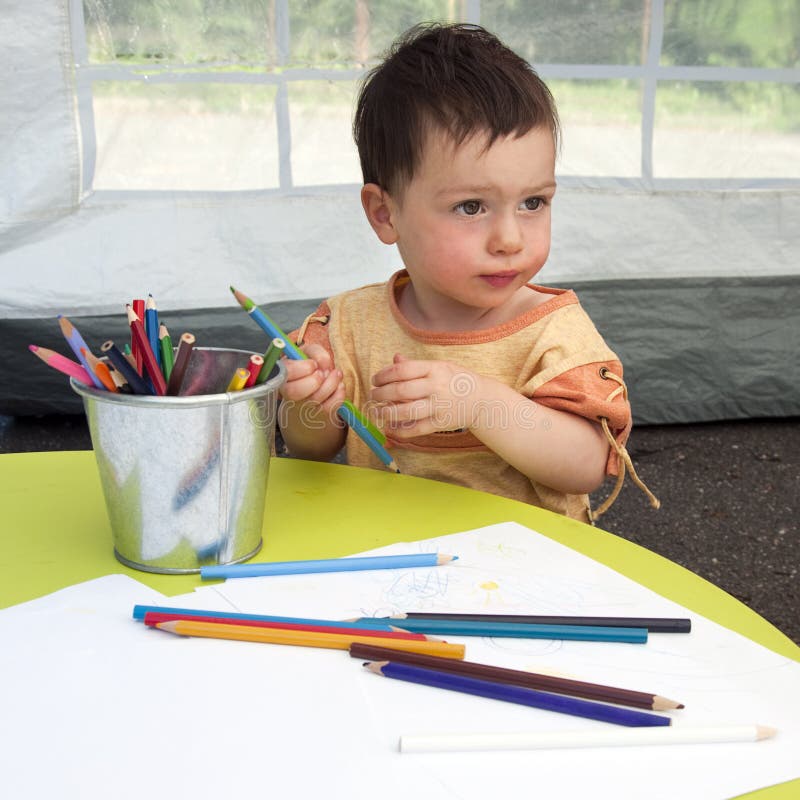 Child drawing stock image. Image of face, crayons, child 16891047