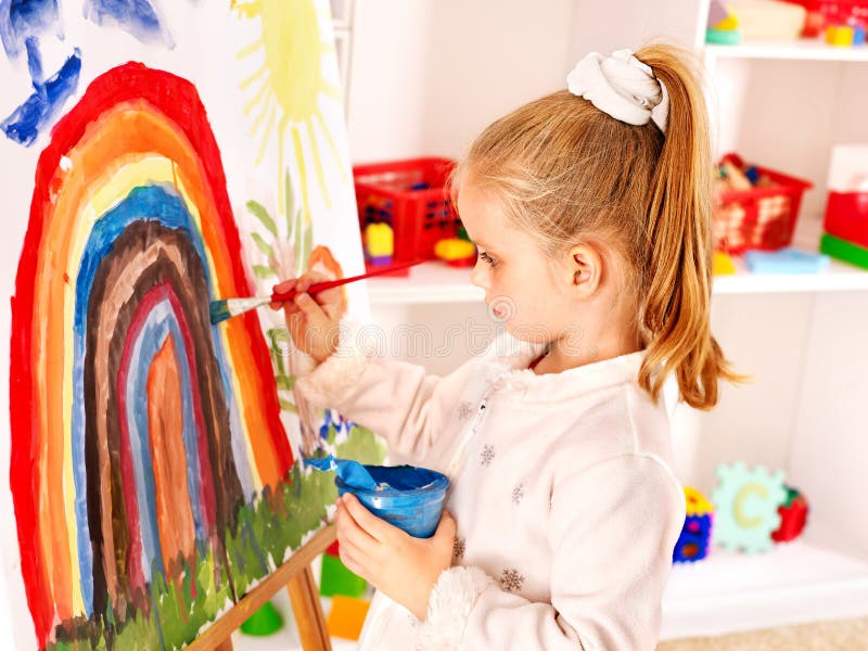 Child Drawing on the Easel. Stock Photo Image of people, home 27677490