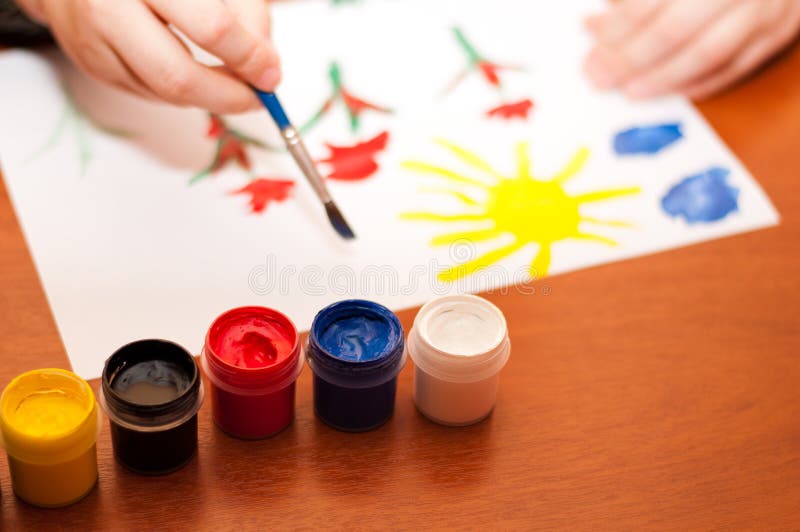 Kid Hands Painting at the Table with Art Supplies, Top View Stock Photo -  Image of childhood, child: 146297712