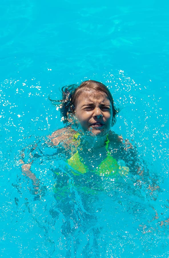 The Child is Drowning in Water. Selective Focus Stock Image - Image of ...