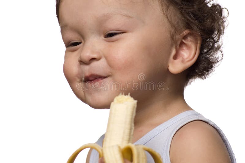 Child eat banana. stock image. Image of feed, tasty, meal 3133413