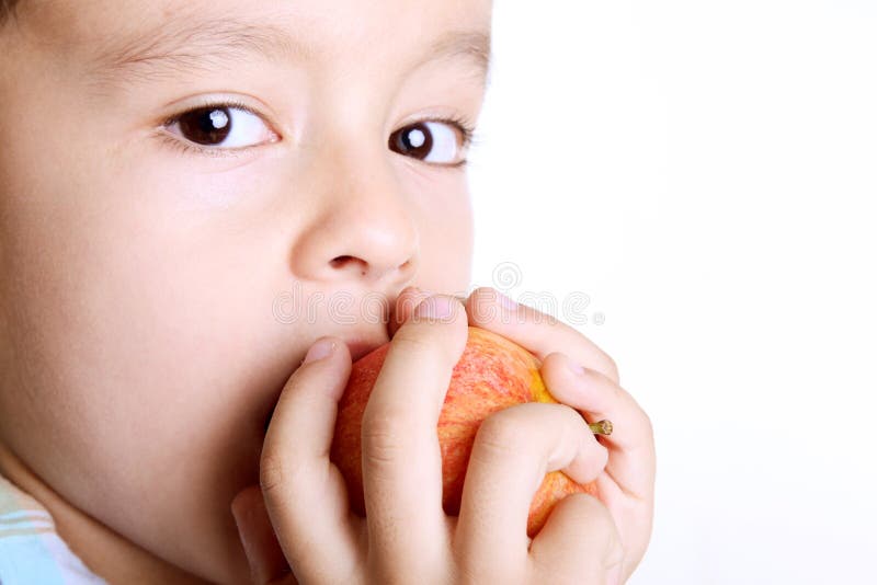 Child eating apple