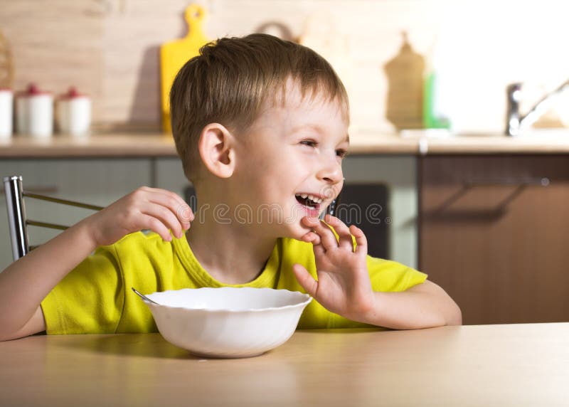 Child eating breakfast