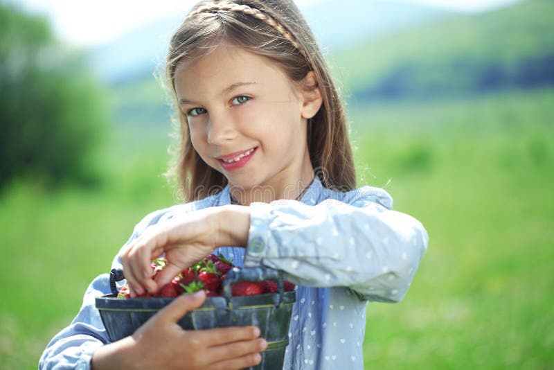 Child Eating Strawberries in a Field Stock Image Image of fruits, berries 39141343