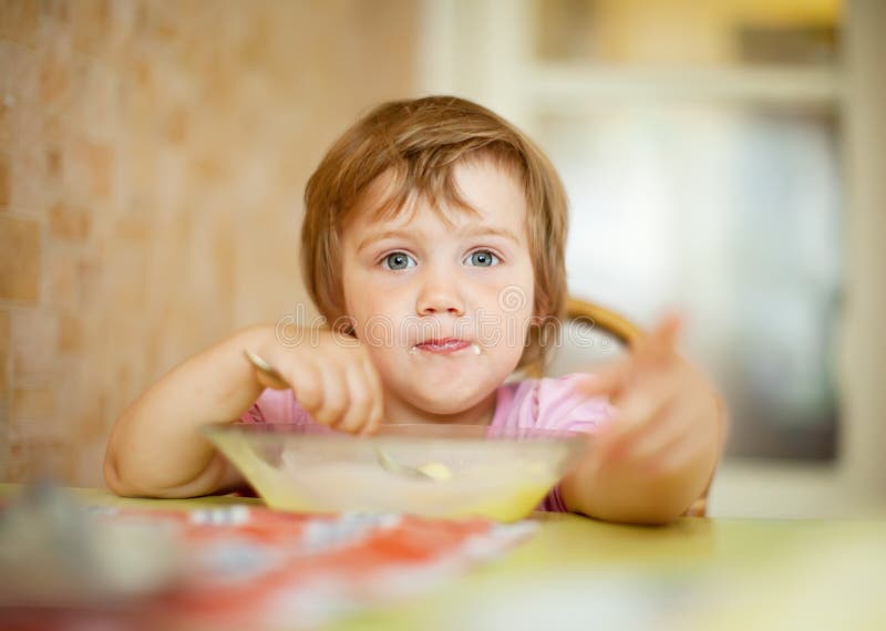 Child eats with spoon stock photo. Image of little, slush 36428174