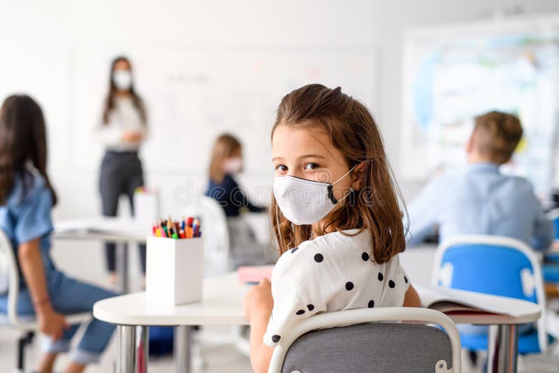 A Teacher and Students Wearing Face Masks · Free Stock Photo