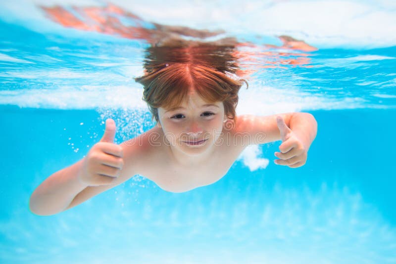 Child Face Underwater with Thumbs Up. Summer Kids Portrait in Sea Water ...