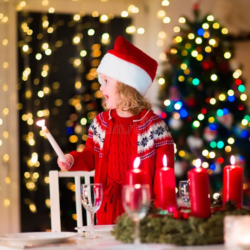 Child at family Christmas dinner at home