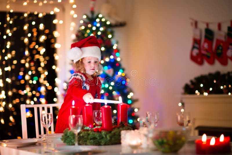 Child at family Christmas dinner at home