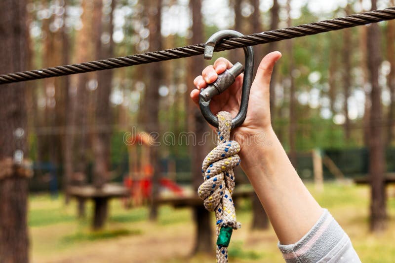 A Child Fastens a Carbine on a Safety Rope Stock Photo Image of