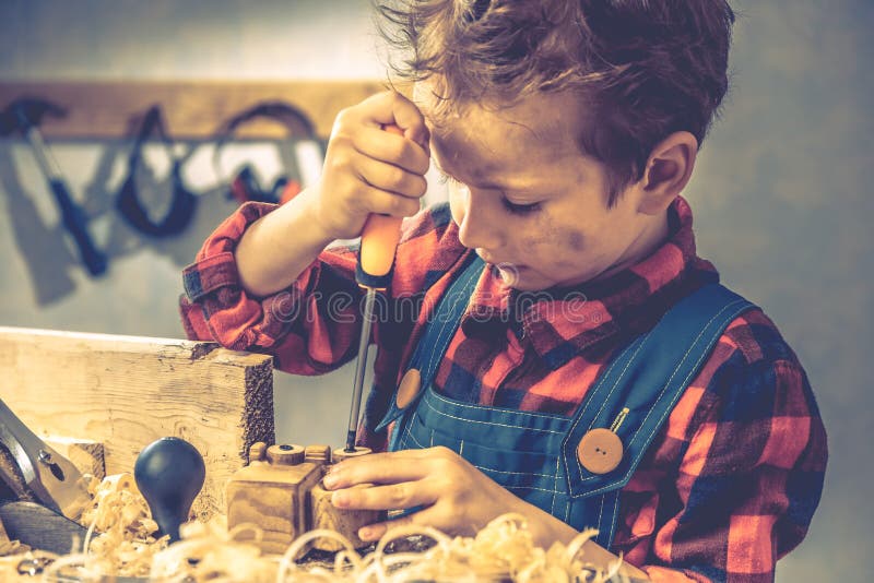 Child fathers day concept, carpenter tool, person childhood royalty free stock images Child fathers day concept, carpenter tool, person childhood royalty free stock images