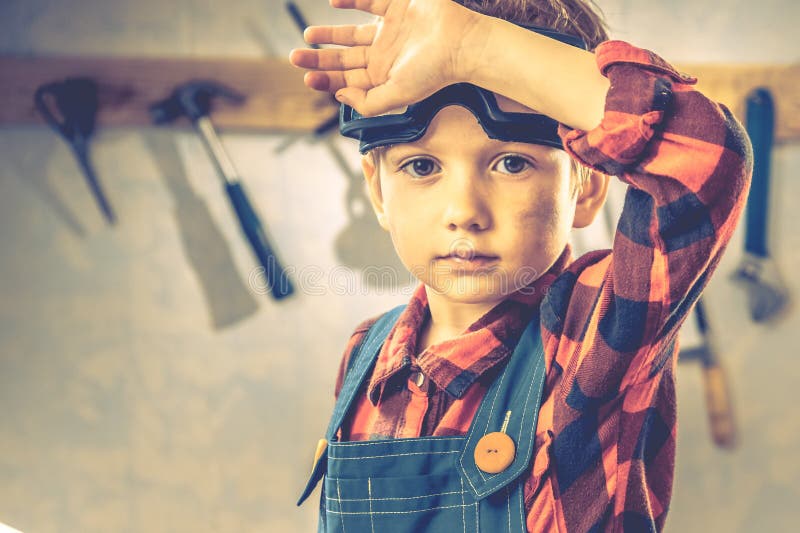 Child fathers day concept, carpenter tool, person little stock photos Child fathers day concept, carpenter tool, person little stock photos