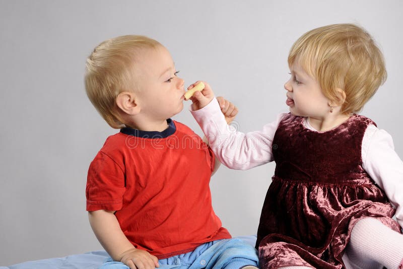 Child feeding boy