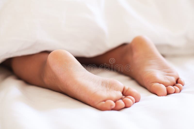 Child Feet Under the Blanket. Stock Image - Image of health, closeup