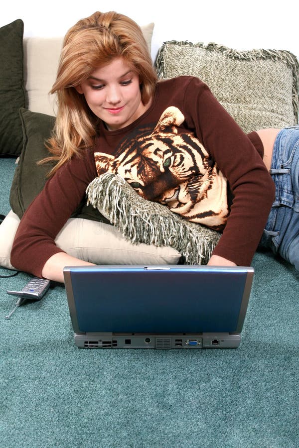 Child On Floor With Laptop stock photo