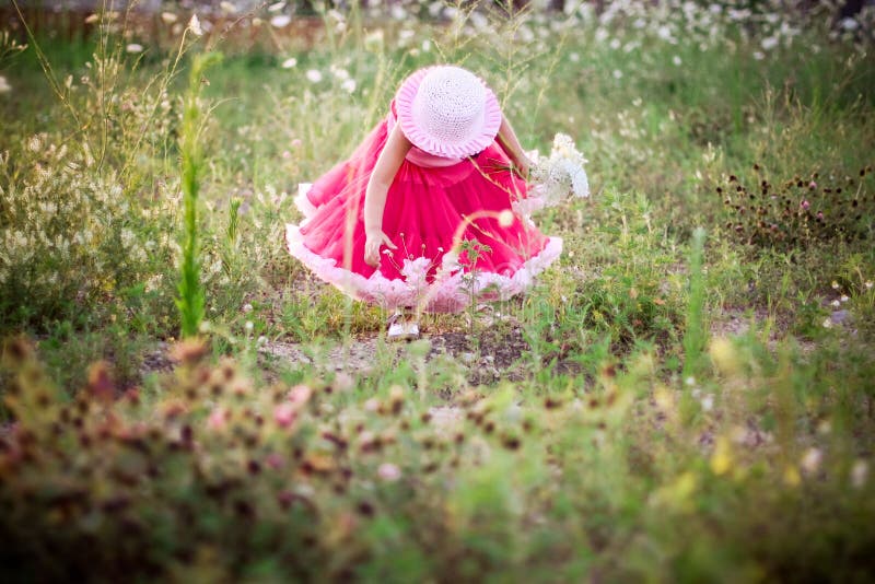 Child in a flower field