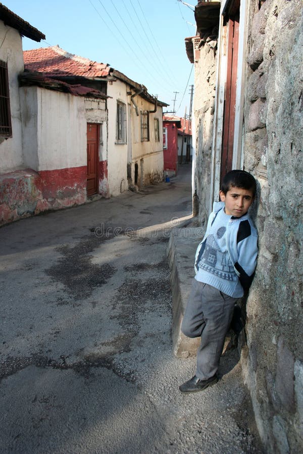 A child in front of his house stock images A child in front of his house stock images
