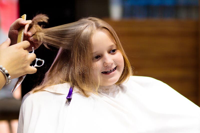 Child Getting Haircut. Hairdresser Cutting Hair Stock Image - Image of ...