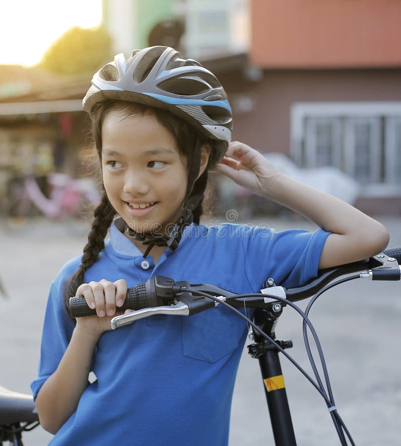 Child girl with bike. stock photo. Image of powered 109175042