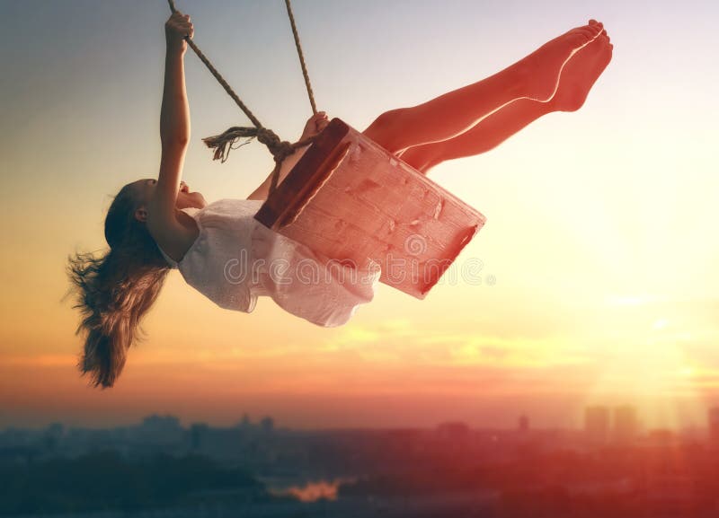 Child girl on swing